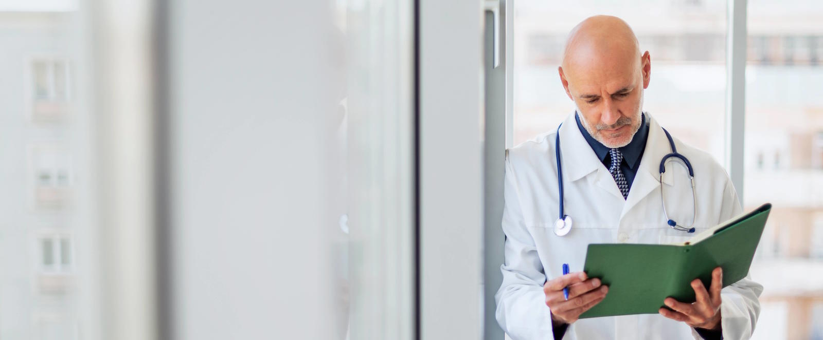Doctor with Journal
